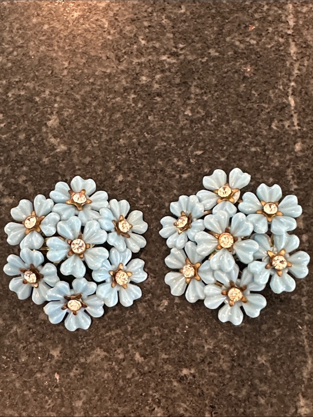 Blue flower clip on earrings with rhinestone centers from the 1950s